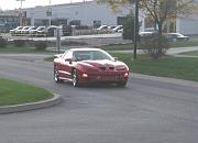 Car at Dealer Entering Lot